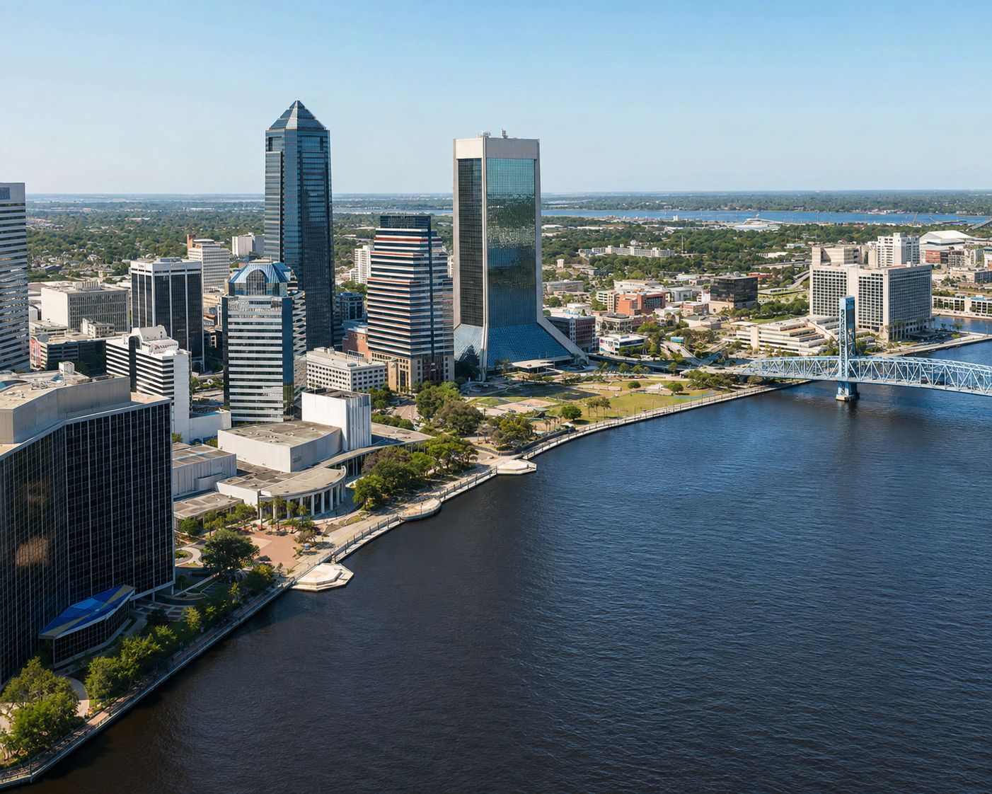 Jacksonville skyline beside the St. Johns River in daylight.