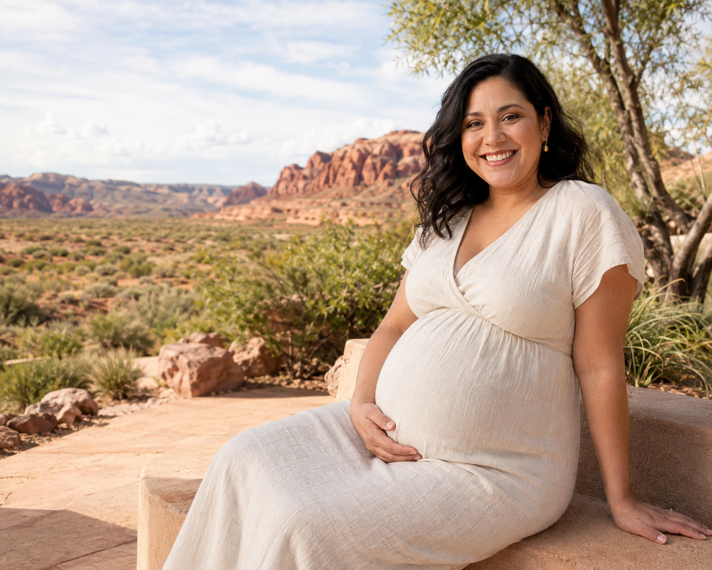 A smiling pregnant woman beside a decorative outline of Nevada.