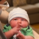 Newborn Silas Golden in a personal family photo accompanying Frank Golden’s reflection on failed embryo transfers and pregnancy loss in surrogacy.
